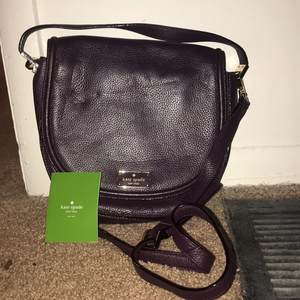 Burgundy round Kate Spade purse